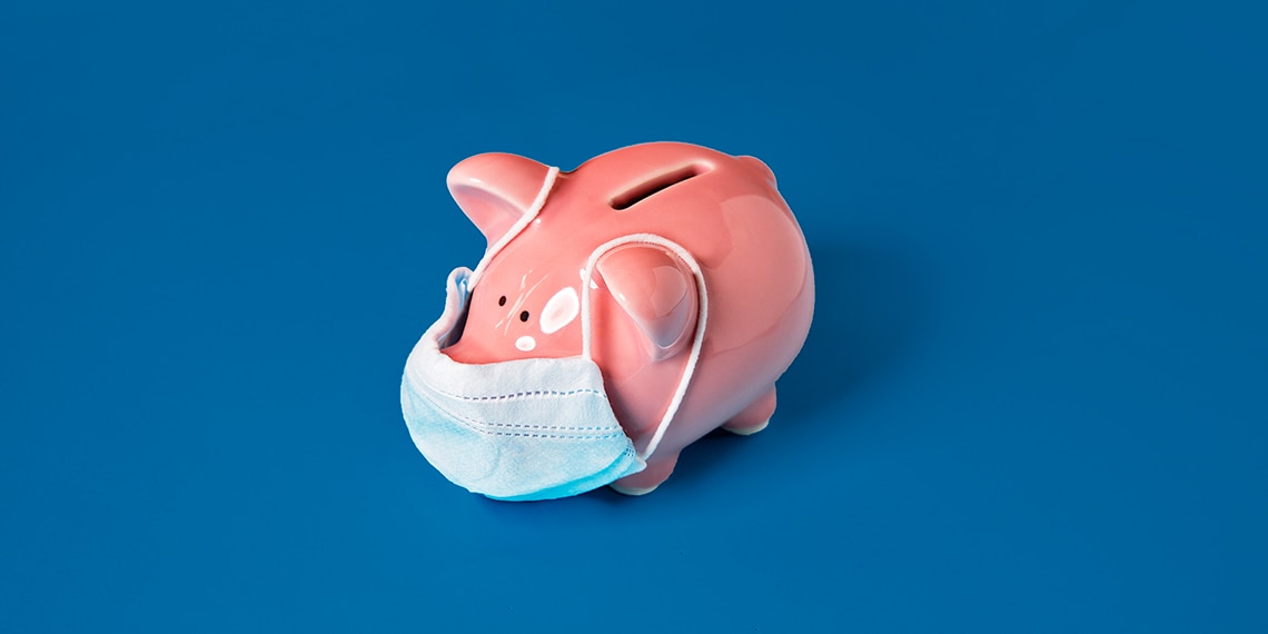 A piggy bank wearing a mask.