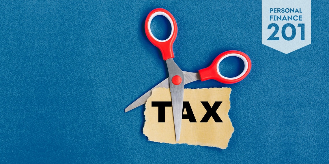 Scissors on the word tax